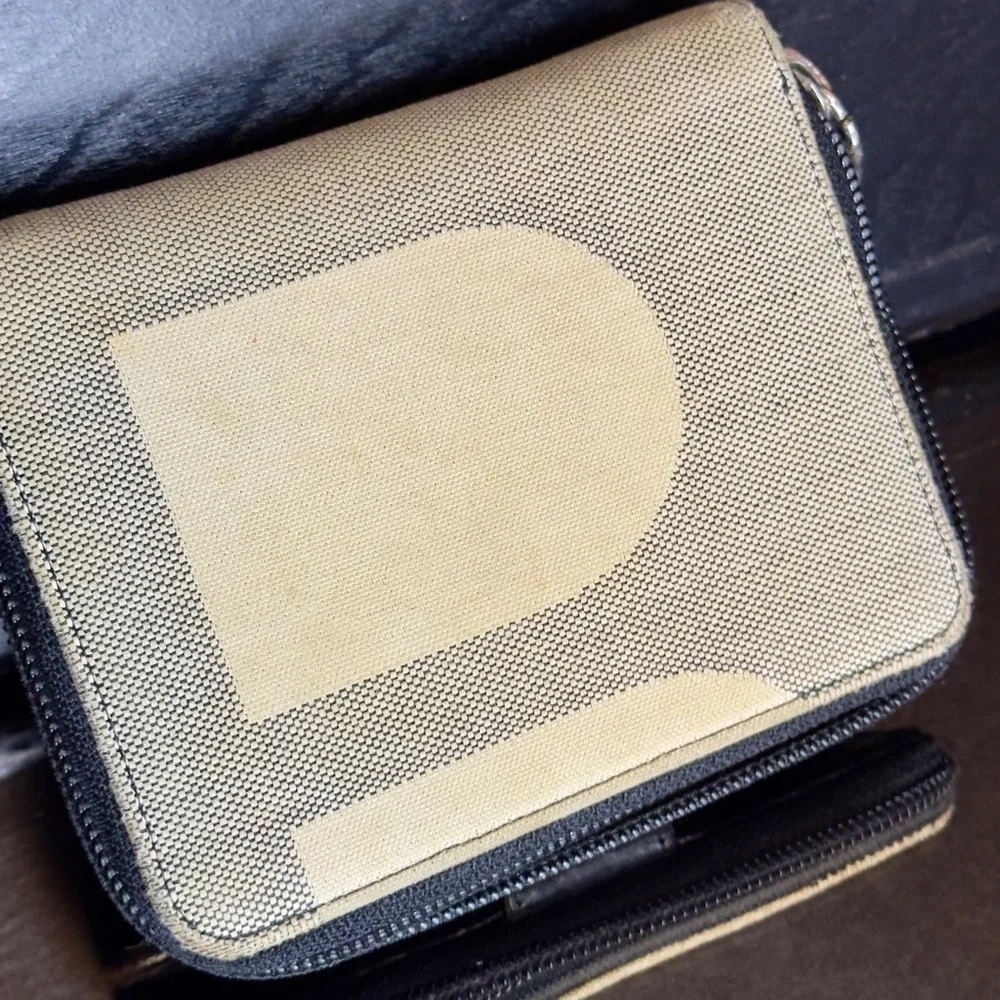 Bally Black Cream Woven Leather Bi Fold Wallet